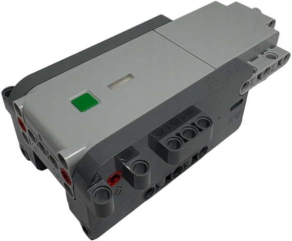 The LEGO Technic Move Hub: a grey brick with a USB-C charging port, a green status light, Technic pin holes along its length and motor axle outputs at each end.